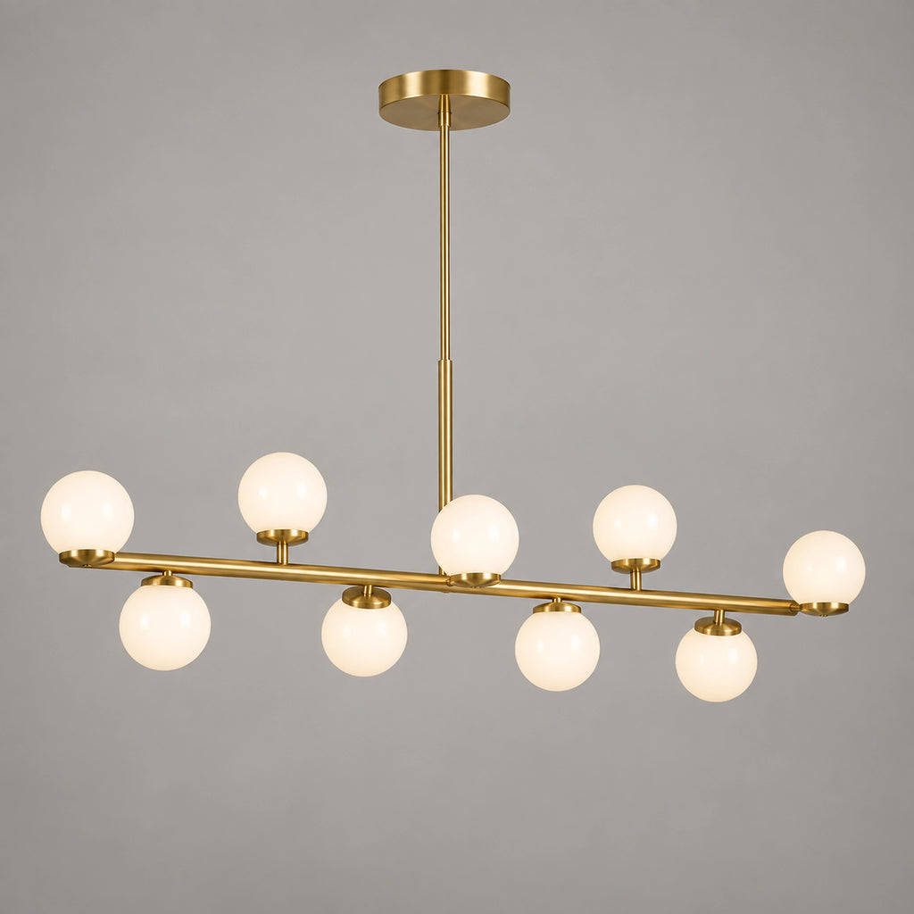 Suspension linéaire dorée à 9 globes opalins