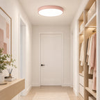 Plafonnier LED rose installé dans une entrée