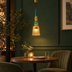 Suspension LED ambre en verre, modèle F, dans un restaurant