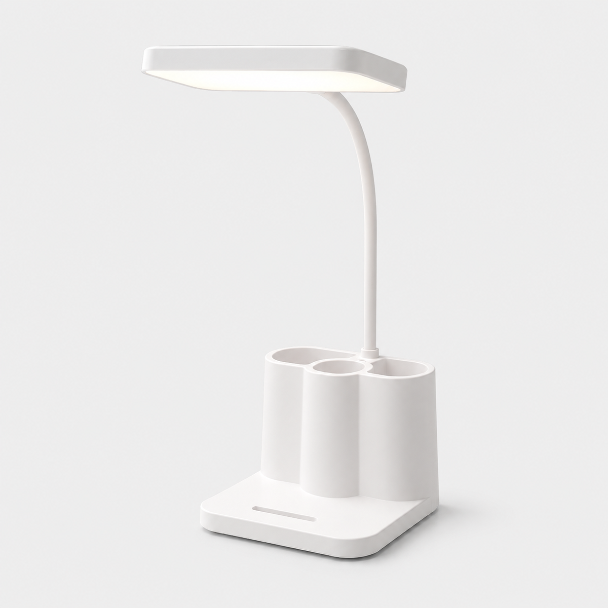 Lampe LED blanche à bras flexible avec porte-stylos et support téléphone, sur fond gris.