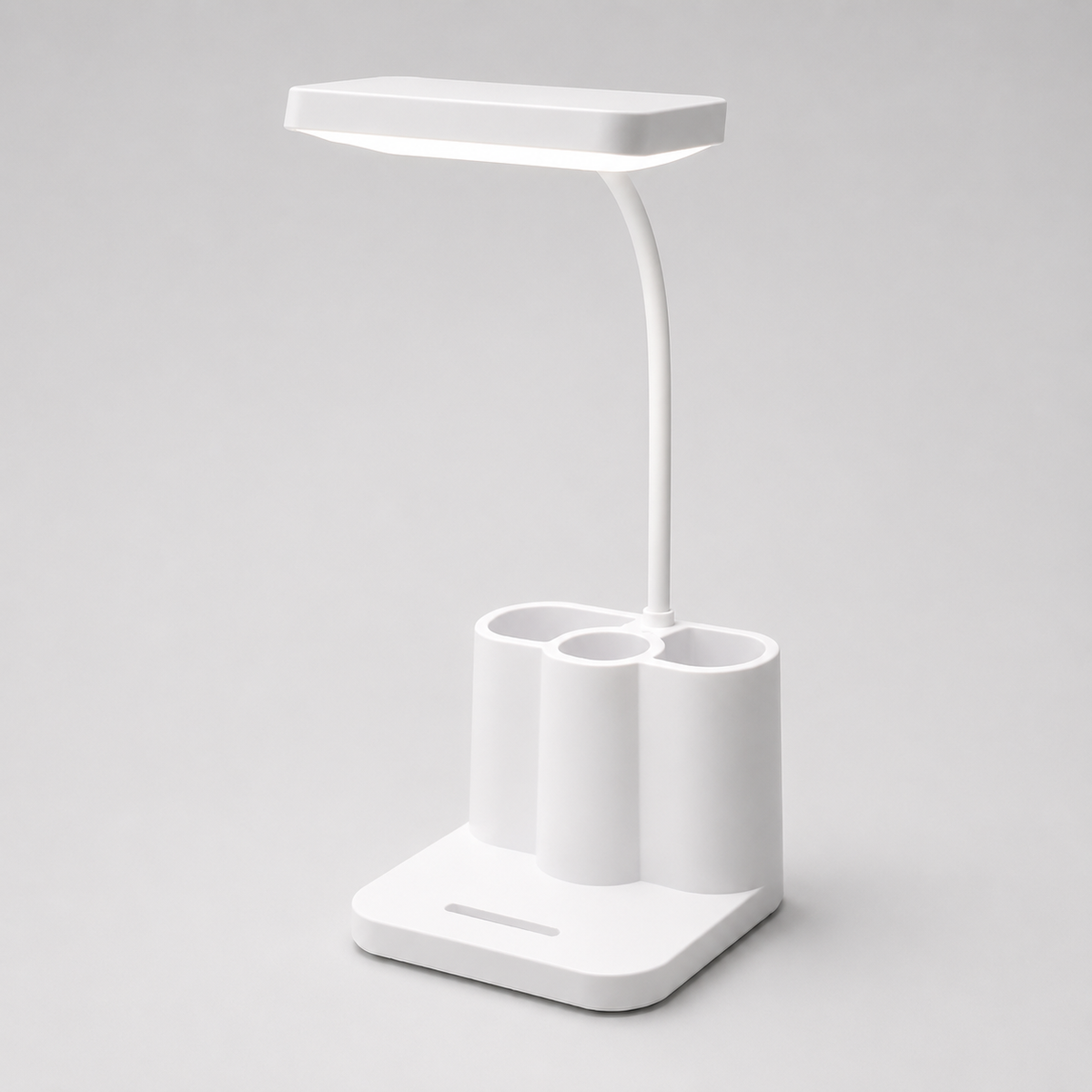 Lampe multifonction éteinte vue de face, base carrée avec compartiments de rangement.