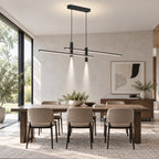 Suspension LED linéaire noire au-dessus d’une grande table
